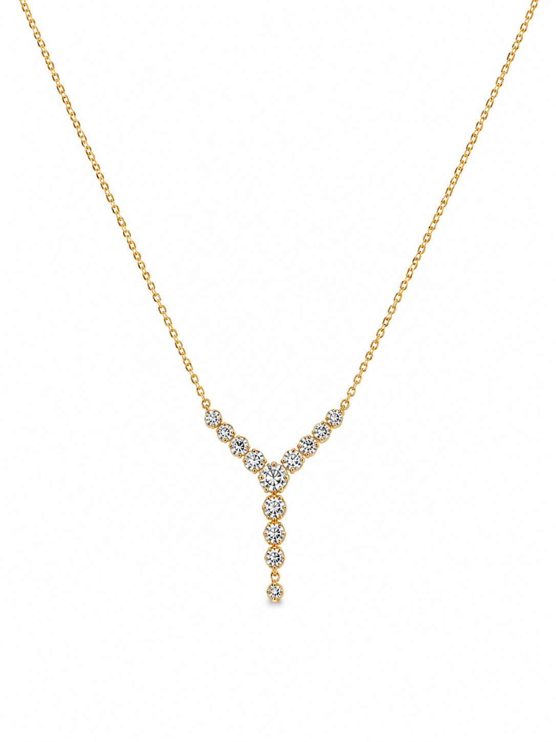 Gold Lumina Y-drop necklace featuring an elegant plunging chevron design adorned with a cascading line of brilliant round-cut clear crystals.